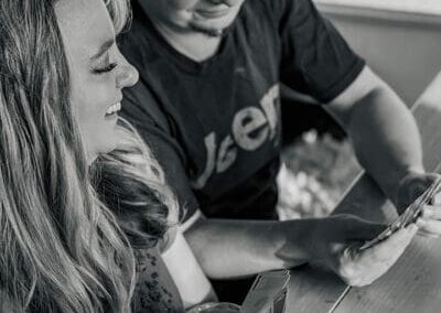 Photo of Raelene and Chris playing a card game